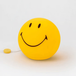 Lampe boule smiley allumée